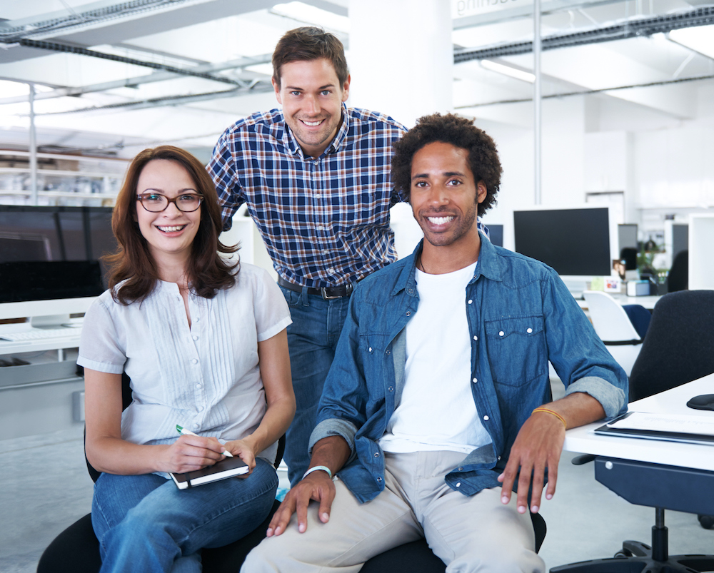 Portrait of office workers posing indoors